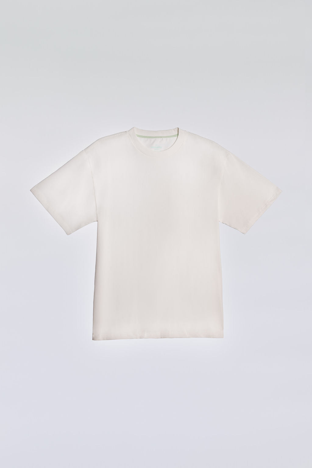 White oversized tee made from soft, breathable fabric for everyday comfort.