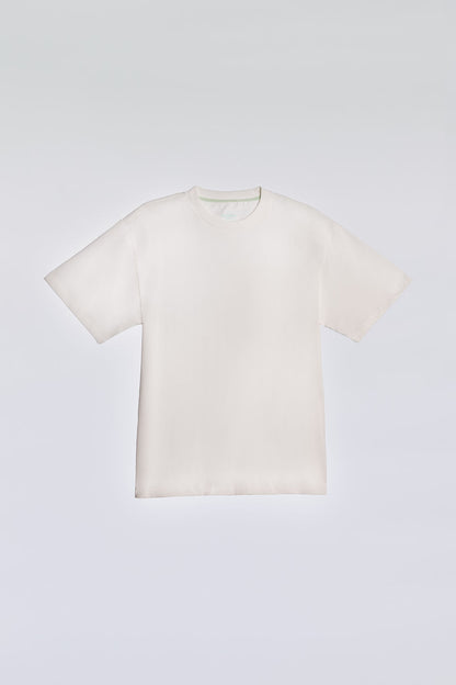 White oversized tee made from soft, breathable fabric for everyday comfort.