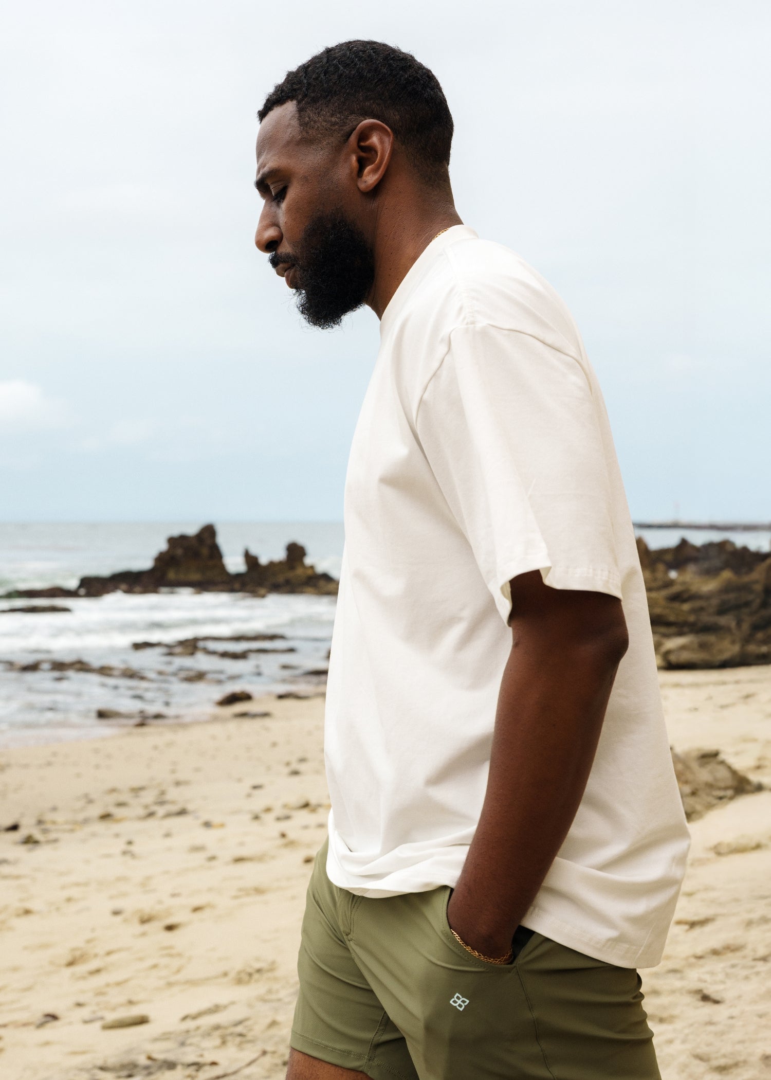 White oversized tee crafted from a soft, breathable blend, perfect for post-workout comfort.