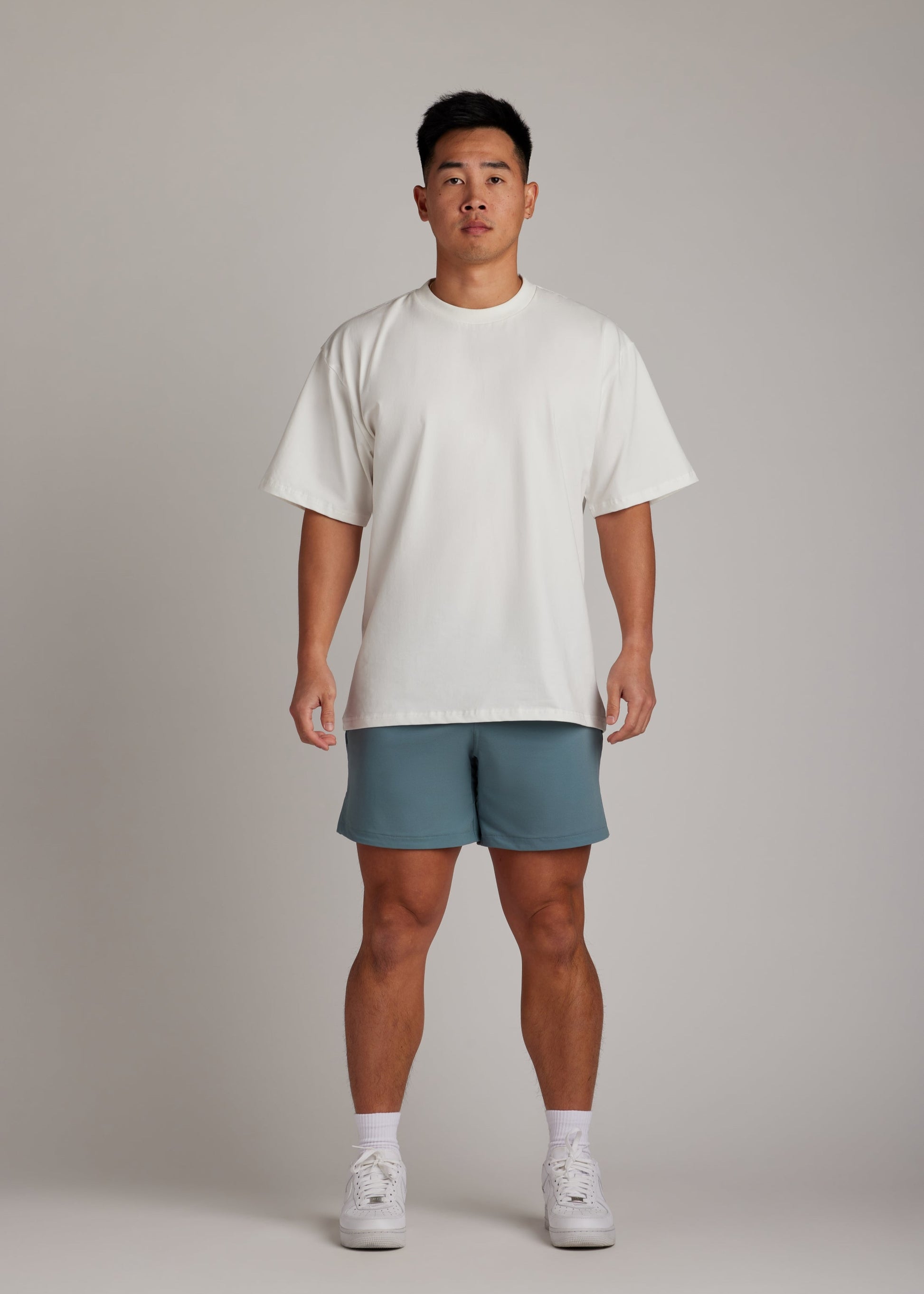 White oversized tee, soft breathable fabric, essential for comfortable everyday casual wear.