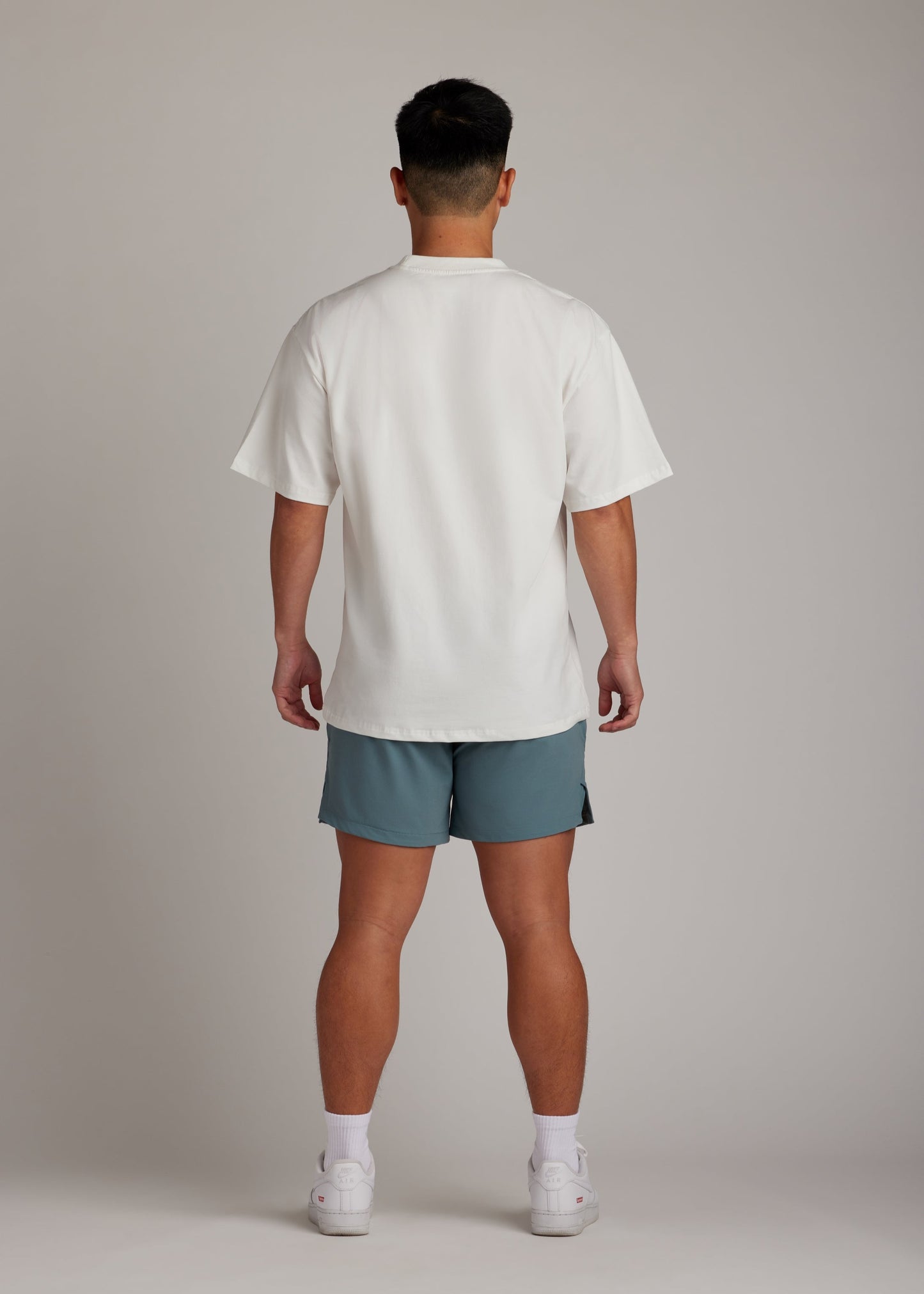 White oversized tee, soft breathable fabric, ultimate go-to piece for comfort and style.