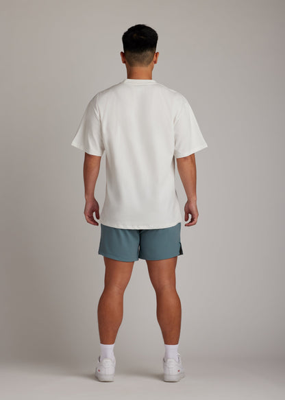 White oversized tee, soft breathable fabric, ultimate go-to piece for comfort and style.
