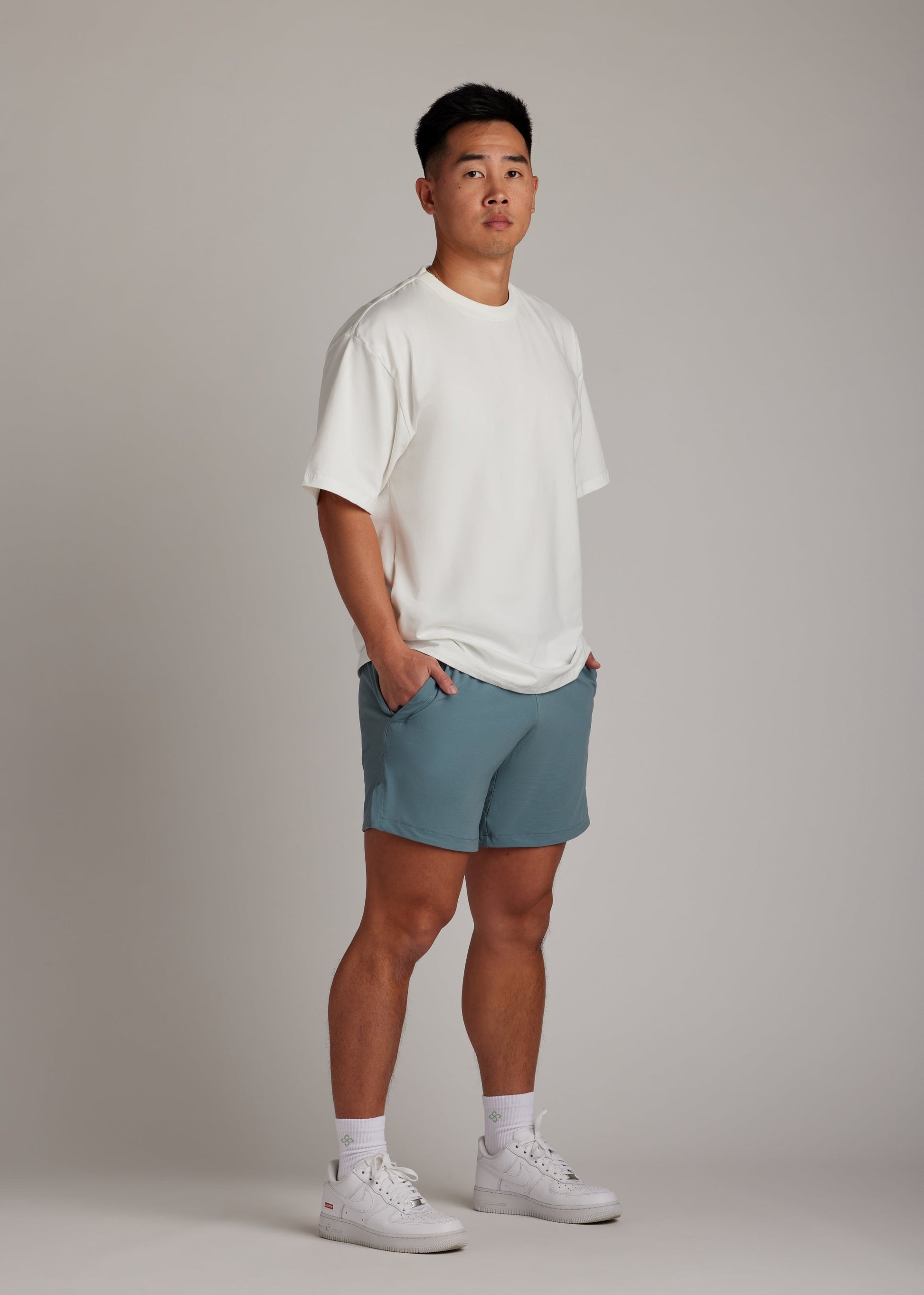 White oversized tee, soft breathable fabric, new wardrobe essential for laid-back comfort.